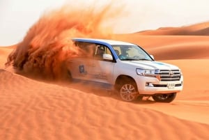 Abu Dhabi: excursão matinal pelo deserto, passeio de camelo e sandboard