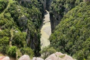 From Berat: Osumi Canyon, Bogova Waterfall, and Pirro Goshi…