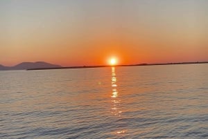 Valona: Esperienza di tramonto in motoscafo nell'ora d'oro