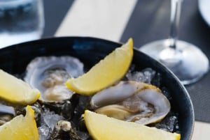 Van boot naar tafel: Zonsondergang en proeverij van Ria Formosa