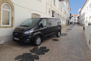 Privétransfer van de Algarve naar Lissabon met een minibus voor 8 personen