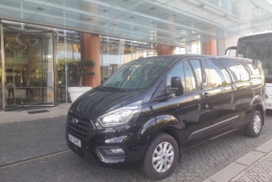 Privétransfer van de Algarve naar Lissabon met een minibus voor 8 personen
