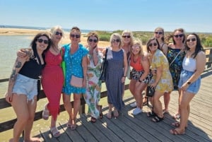 Kysttur ved solnedgang med champagne og middag