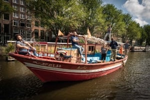 Amsterdam: Paseo en barco por el canal en un barco de madera para refugiados