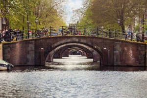 Amsterdam: City Highlights Small Boat Canal Cruise with host