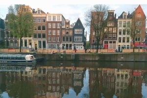 Amsterdam: Day City tour with local Guide in German