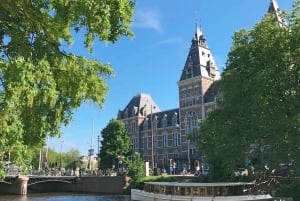 Amsterdam: Day City tour with local Guide in German