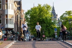 Amsterdam: tour in e-scooter Tour dei canali dorati (2 ore)