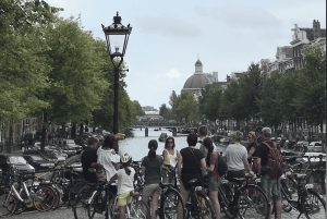 Amsterdam: Tour guiado de la ciudad en bicicleta en francés