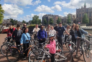 Amsterdam: Tour guiado de la ciudad en bicicleta en francés
