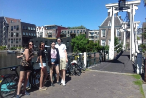 Amsterdam: Tour guiado de la ciudad en bicicleta en francés