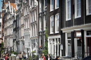 Amsterdam: Tour guiado de la ciudad en bicicleta en francés