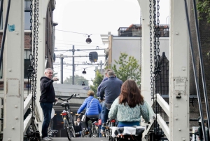 Amsterdam: Tour guiado de la ciudad en bicicleta en francés