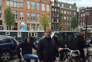 Amsterdam: Tour guiado de la ciudad en bicicleta en francés