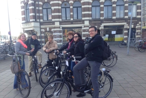 Amsterdam: Tour guiado de la ciudad en bicicleta en francés