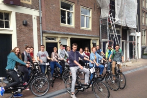 Amsterdam: Tour guiado de la ciudad en bicicleta en francés