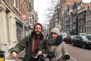 Amsterdam: Tour guiado de la ciudad en bicicleta en francés