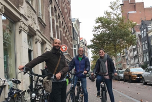 Amsterdam: Tour guiado de la ciudad en bicicleta en francés