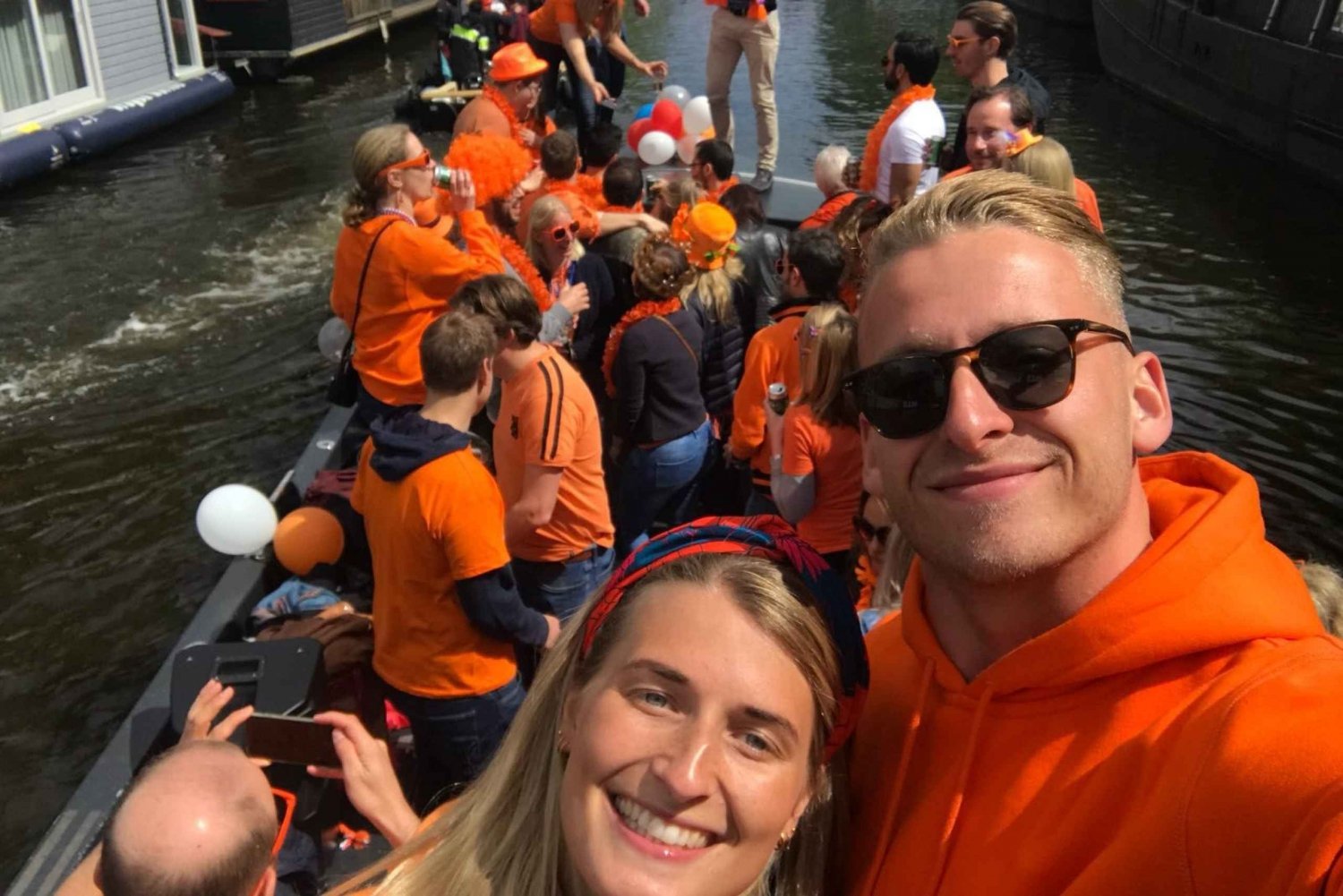 Amsterdam: King's Day Party Cruise with Open Bar & Music