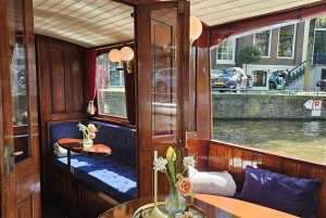 Amsterdam: luksusowy prywatny rejs kanałami w języku niemieckim z napojami