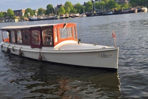 Amsterdam: luksusowy prywatny rejs kanałami w języku niemieckim z napojami