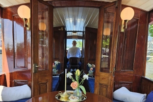 Amsterdam: luksusowy prywatny rejs kanałami w języku niemieckim z napojami