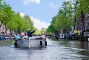 Amsterdam med öppen båt Kanalkryssning med öppen båt