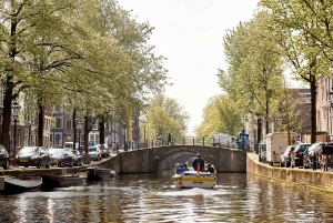 Amsterdam: Open Boat Tour with Local Guide