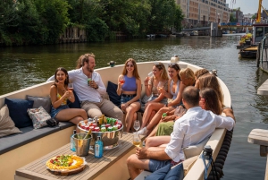 Amsterdam: Private Canal Booze Cruise with Unlimited Drinks