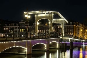 Amsterdam: Private Canal Cruise in German + Unlimited Drinks