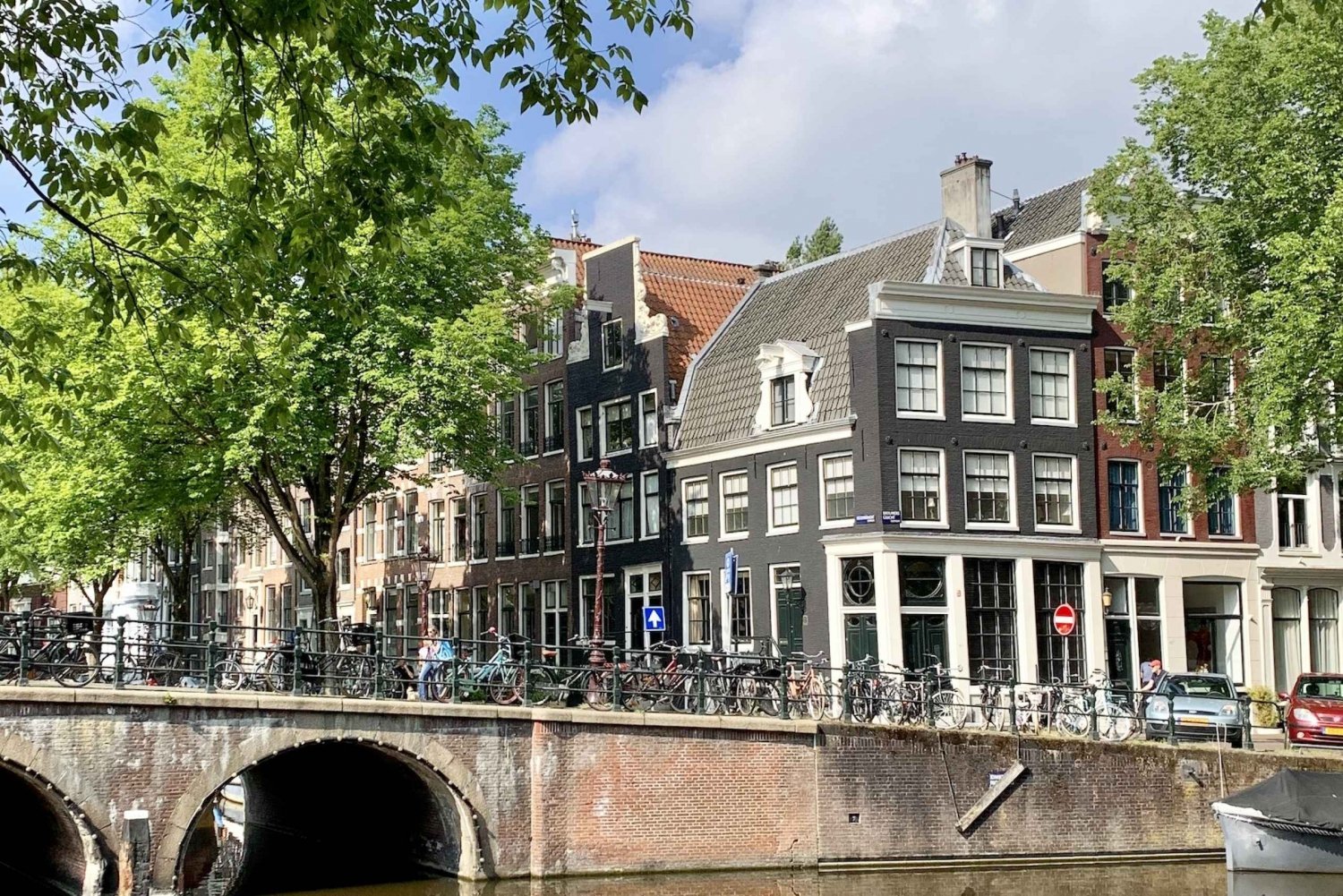 Amsterdam: Quartiere a luci rosse e tour della città in tedesco o in inglese