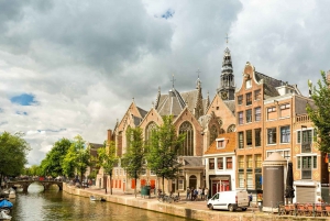 Amsterdam: tour del quartiere a luci rosse in inglese o tedesco
