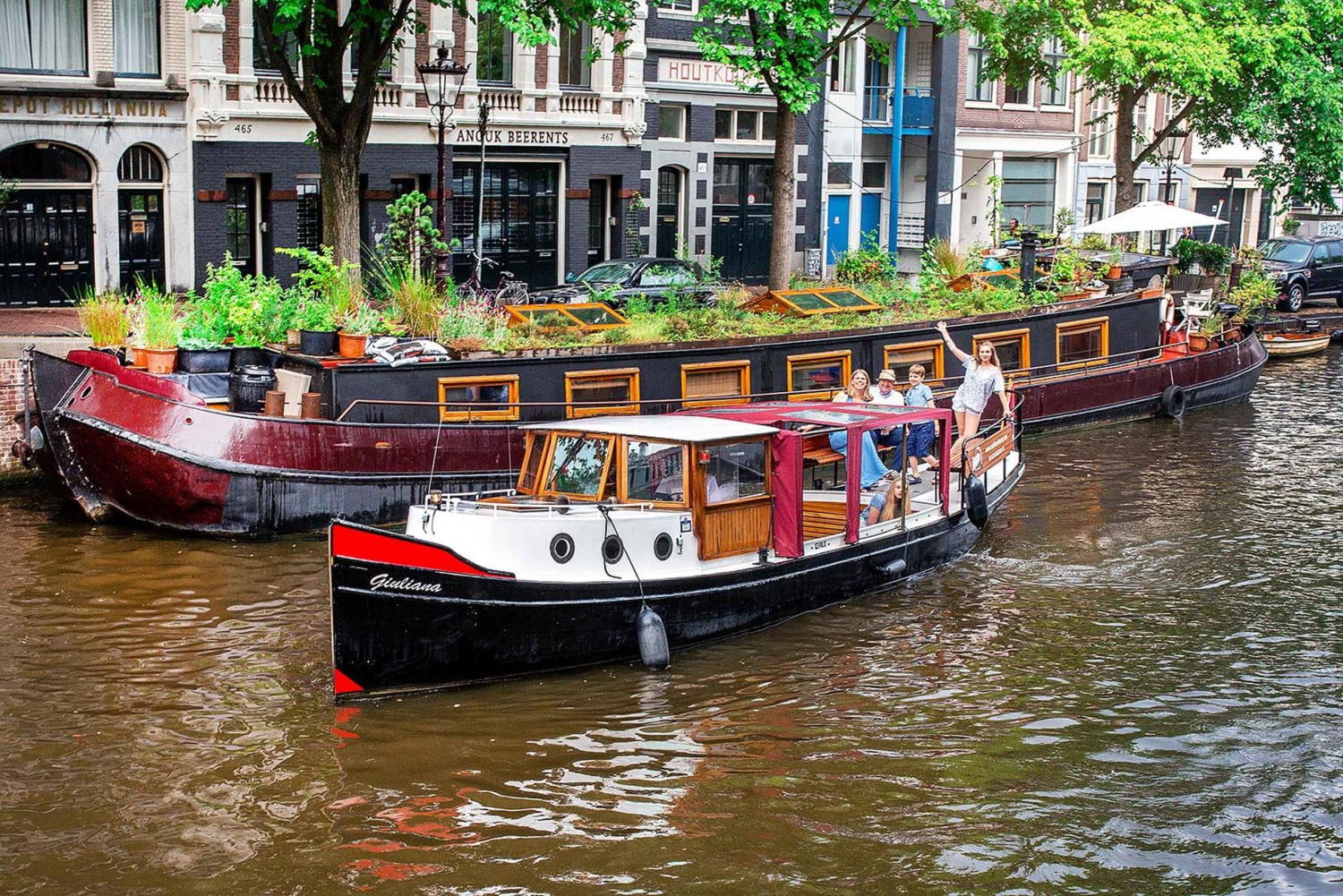 Amsterdam: Paseo en barco por el canal para grupos pequeños, bebidas y aperitivos incluidos