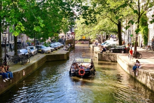 Crociera sul canale di Amsterdam per piccoli gruppi con spuntini/bevande inclusi