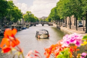 Amsterdam: crociera in barca aperta guidata in spagnolo con bar a bordo