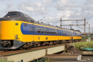 Amsterdam: Trein + tram van/naar Scheveningen
