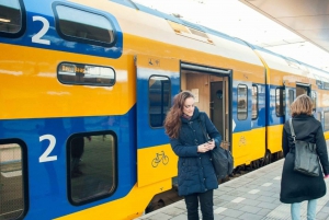 Amsterdam: Trein + tram van/naar Scheveningen