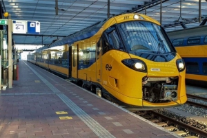 Amsterdam: Trein + tram van/naar Scheveningen