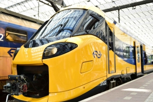 Amsterdam: Trein + tram van/naar Scheveningen