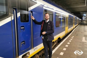Amsterdam: Train Transfer Schiphol Airport from/to Den Haag