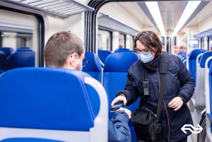 Amsterdam: Train Transfer Schiphol Airport from/to Den Haag