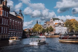 Paseo en Barco por los canales de Amsterdam con guía en Español