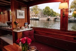 Paseo en Barco por los canales de Amsterdam con guía en Español