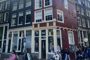 Immortalisez l'Amsterdam emblématique : promenade photo avec un photographe professionnel