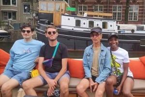 Visiter Amsterdam en Bateau avec un Guide Francais (french)