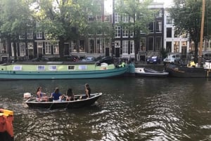 Visit Amsterdam by Boat with a French Guide (french)