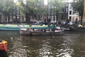 Visit Amsterdam by Boat with a French Guide (french)