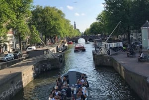 Visit Amsterdam by Boat with a French Guide (french)