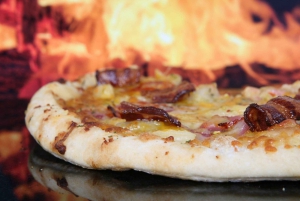 Join us in this unique Argentinean grilled pizza experience