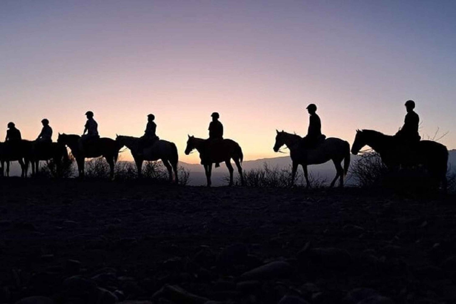 Reiten bei Sonnenuntergang und Abendessen in Mendoza